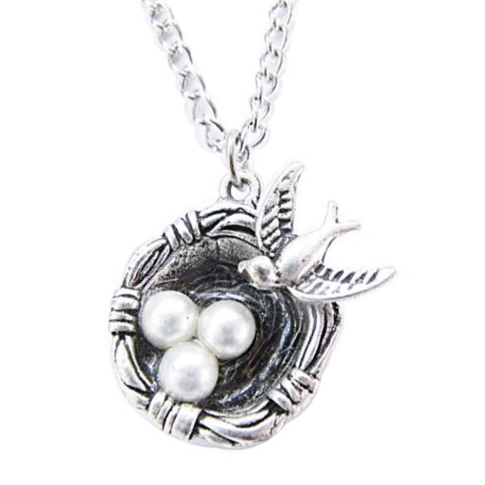 Silver bird nest pendant necklace